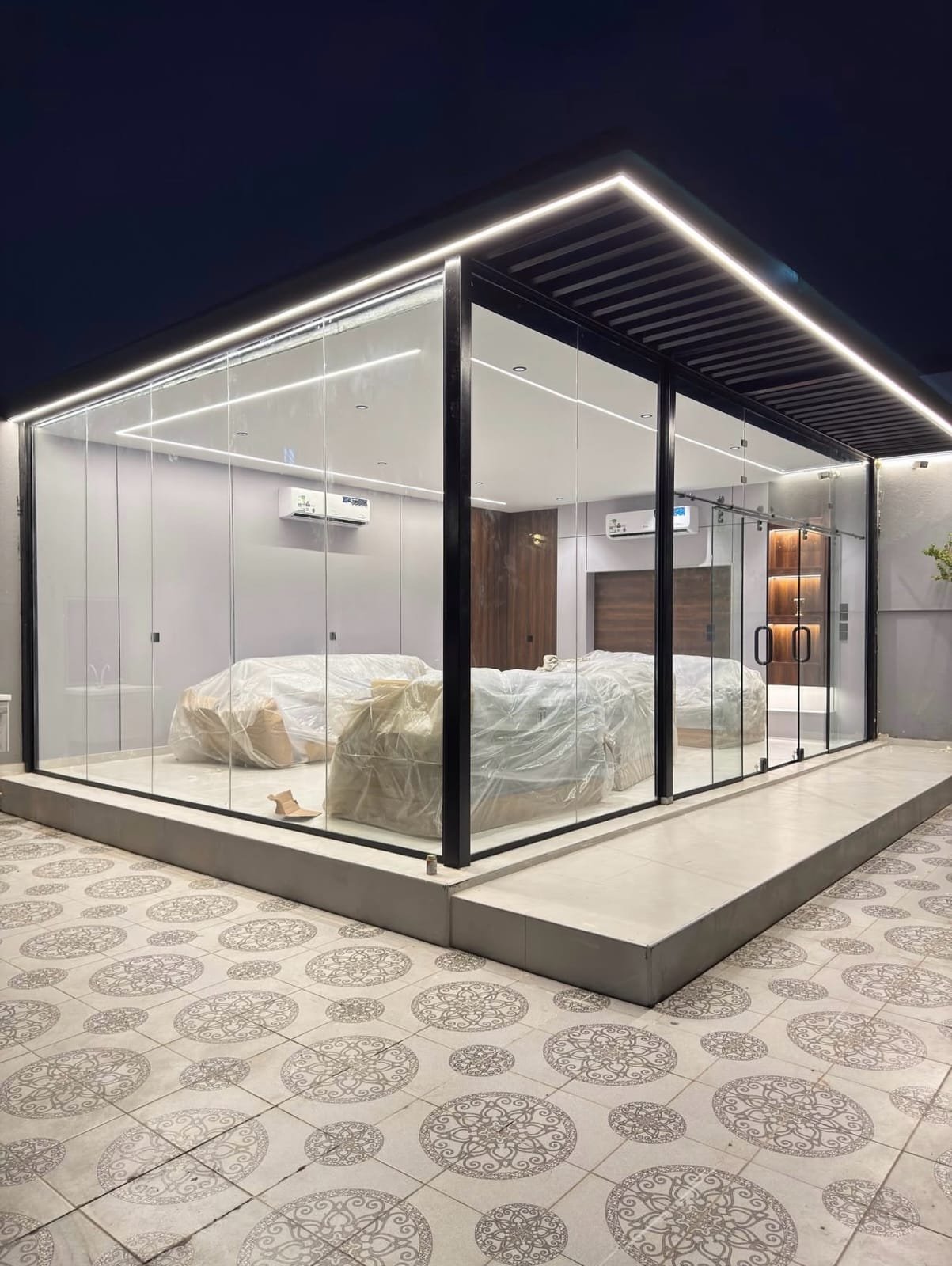 Glass enclosure — night-lit pavilion