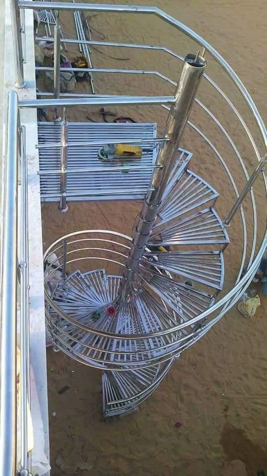 Spiral stair — outdoor rod infill