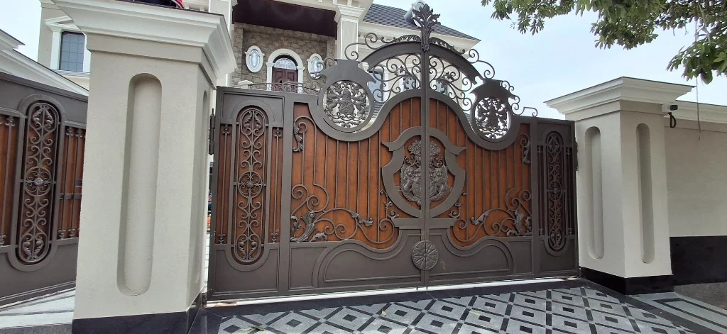 Classical crest gate — ornate metal
