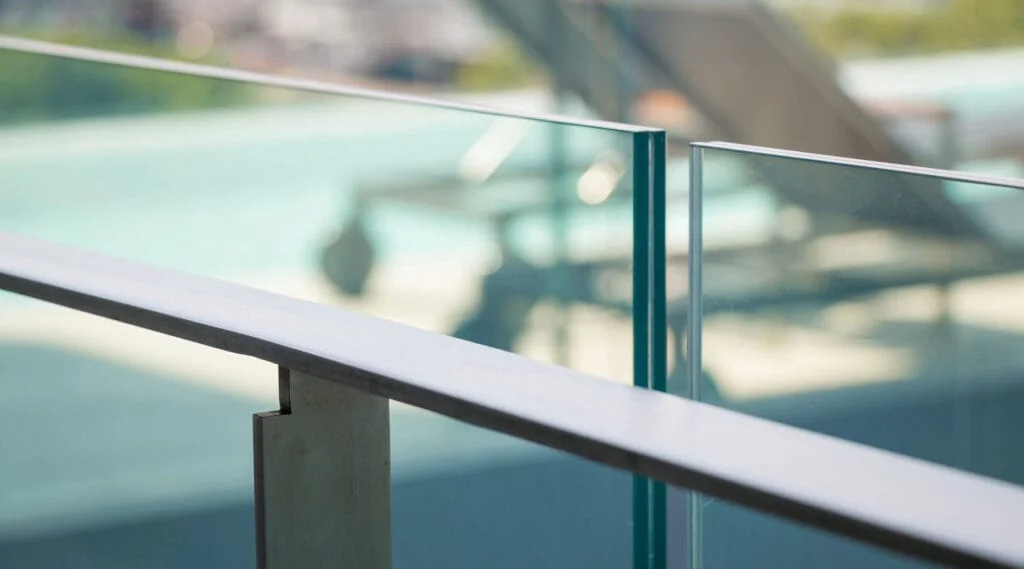 Curved tinted glass — exterior balconies